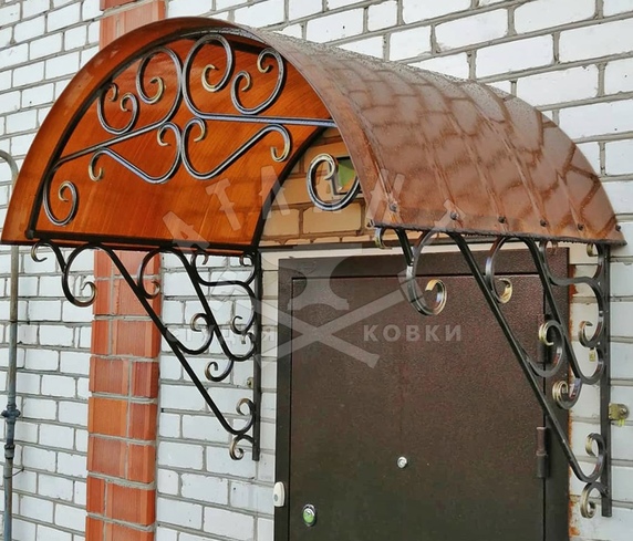 Витой арочный кованый козырек КК-344
